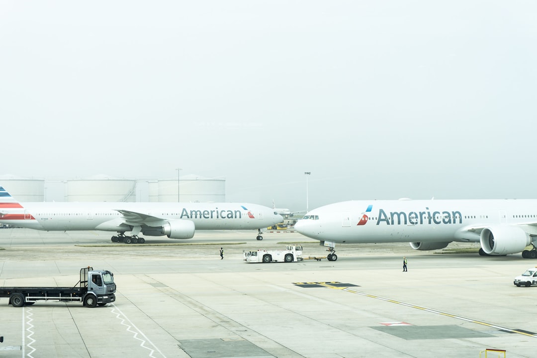 two American Airlines planes on airport, Airport runway American