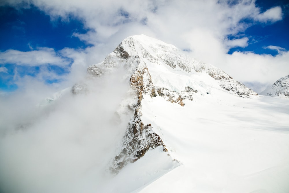 snow covered snow during daytime