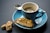 cup of coffee and bread on saucer closeup photography