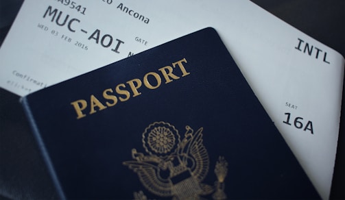 passport booklet on top of white paper