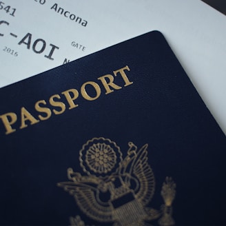 passport booklet on top of white paper