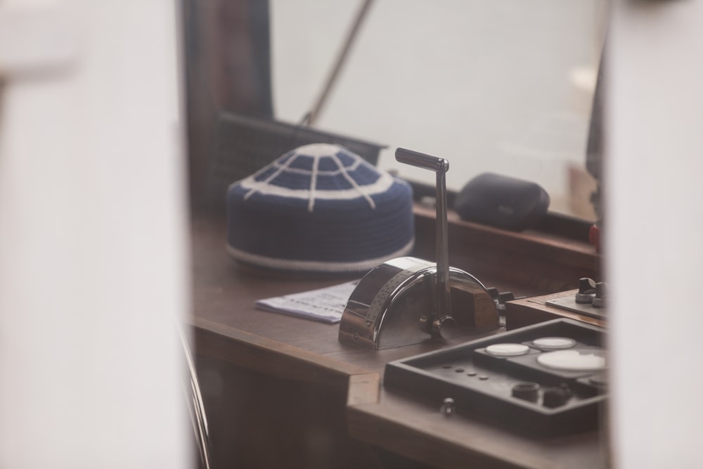 blue cushion on brown wooden desk