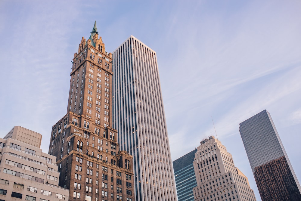 high-rise concrete buildings under blue sky