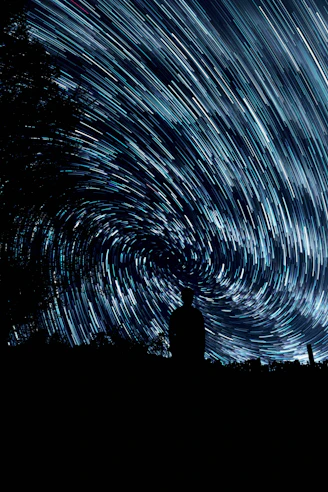 silhouette photo of person standing