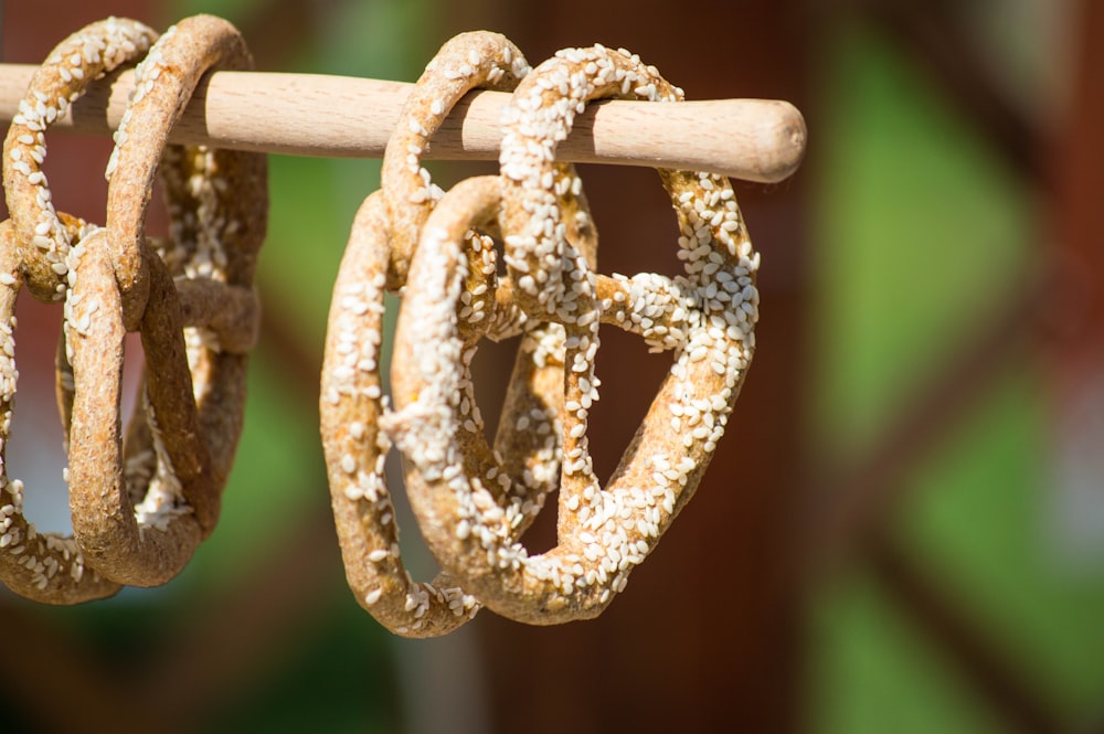 focus photo of four brown pretzels