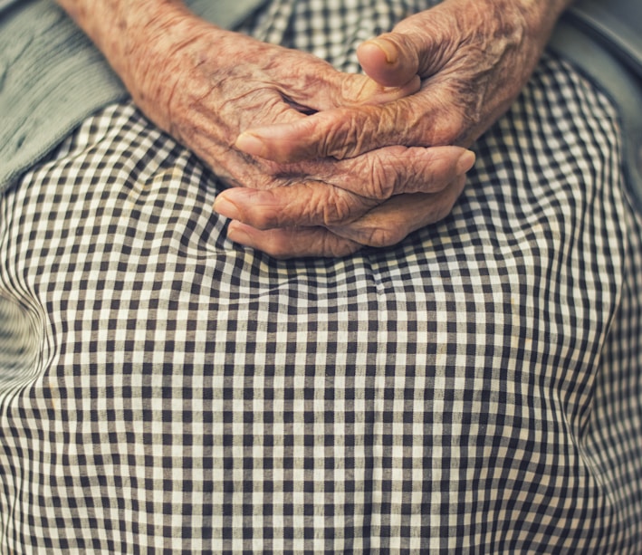 person's hand in shallow focus