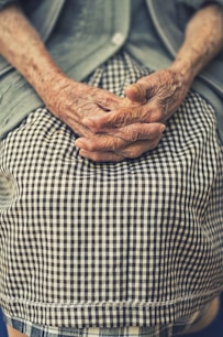 person's hand in shallow focus