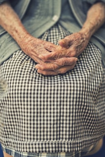 person's hand in shallow focus