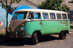 green and white Volkswagen T2
