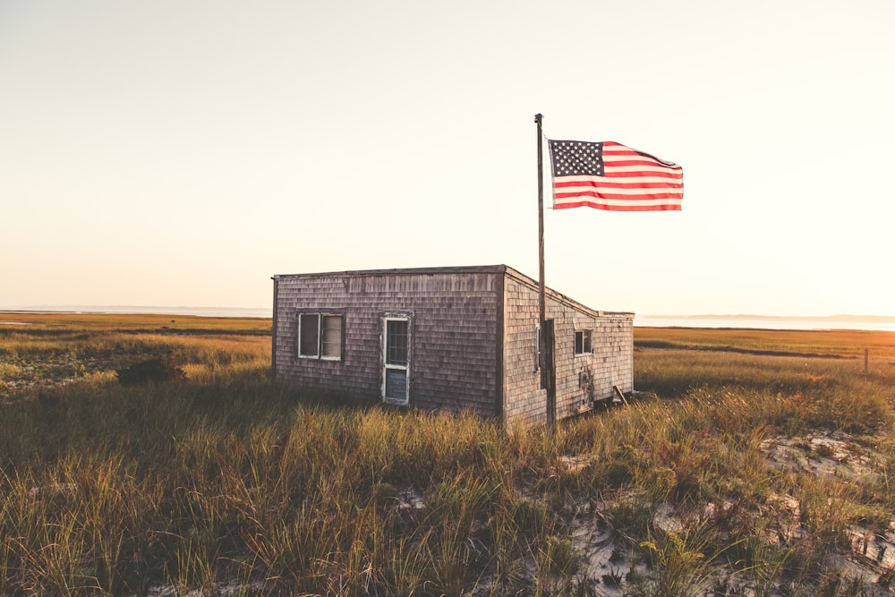 Small building with an American flag at Chatham beach