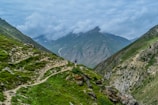 person standing on gray mountain