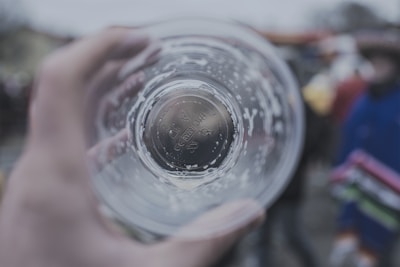 Close-up of a custom cup featuring a QR code and colorful artwork.
