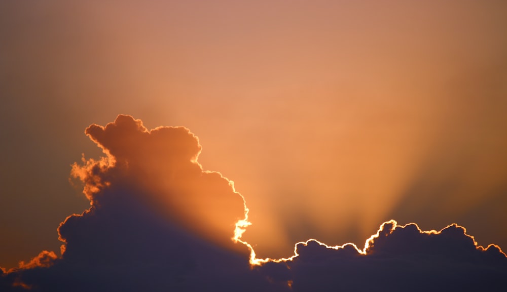 silhouette of cloud with sunlight