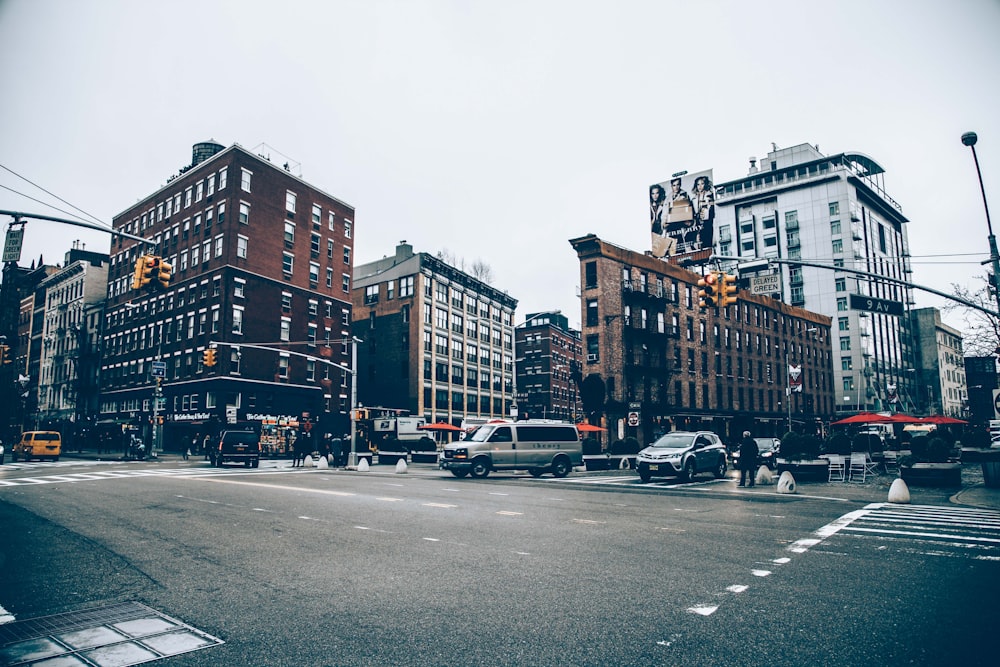 cars near buildings at daytime