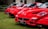 three red Ferrari cards