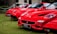 three red Ferrari cards