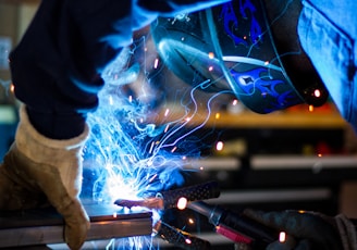 man holding gray steel frame