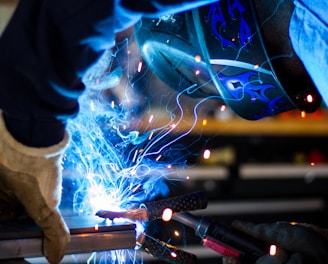 man holding gray steel frame