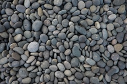 aerial photography of gray and white stone lot