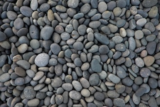 aerial photography of gray and white stone lot