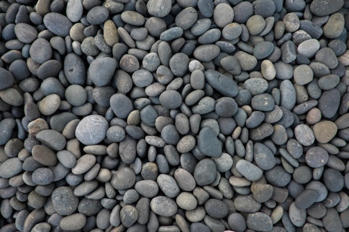 aerial photography of gray and white stone lot