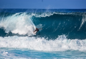 person surfing on wave