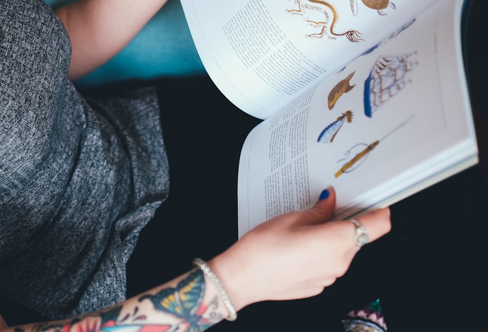 person holding book