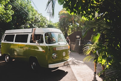 green and white Volkswagen transporter during daytime