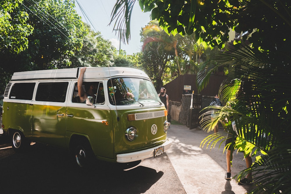 green and white Volkswagen transporter during daytime