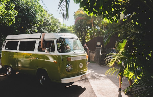 green and white Volkswagen transporter during daytime