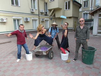 A silly snapshot of everyone wearing goofy hats and making funny faces