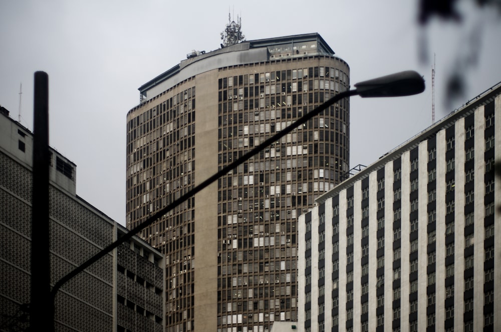 utility post near high rise building