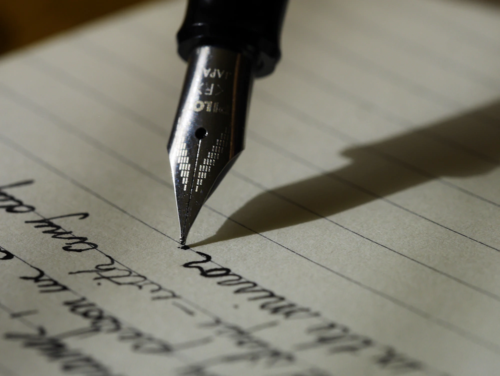 Executive notebook and premium writing instrument