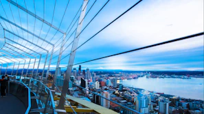 Sky gym at Beacon Executive Suite featuring state-of-the-art equipment overlooking the city skyline