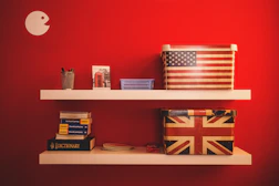 two gift boxes on floating shelf