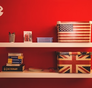 two gift boxes on floating shelf