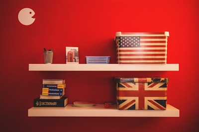 two gift boxes on floating shelf english google meet background