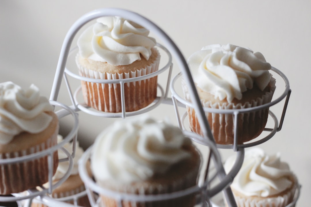 photo of baked cupcakes on white cupcake tray