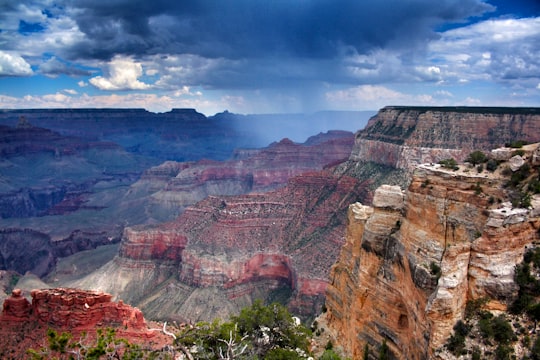 brown and gray rocky mountain under cloudy sky in Grand Canyon National Park United States