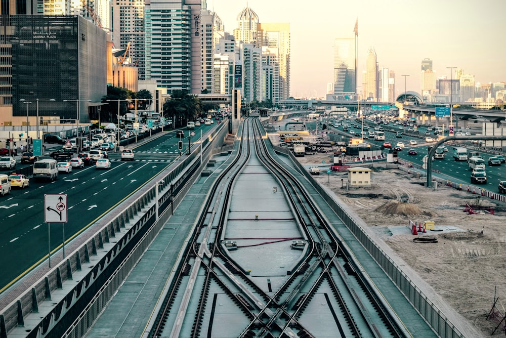 bird's-eye of view of train rail in the middle of city