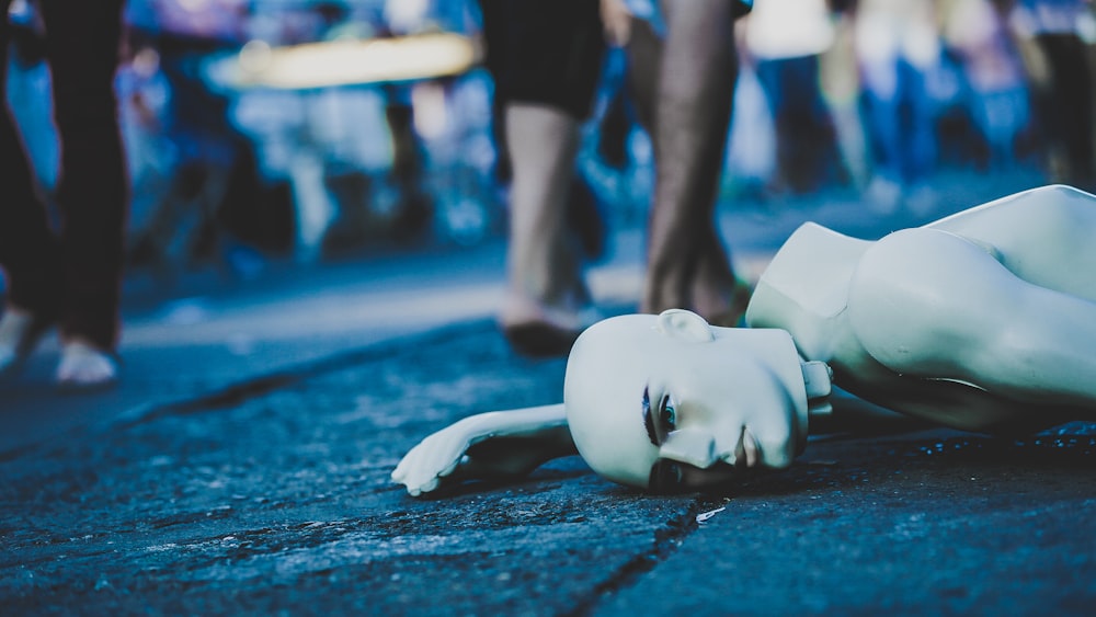 mannequin lying down on floor