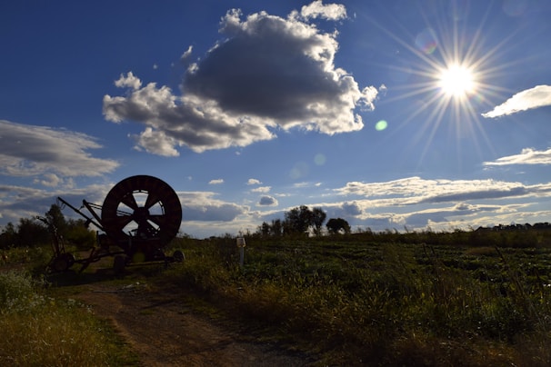 High-tech agricultural hardware set against a backdrop of a bright, clear sky.