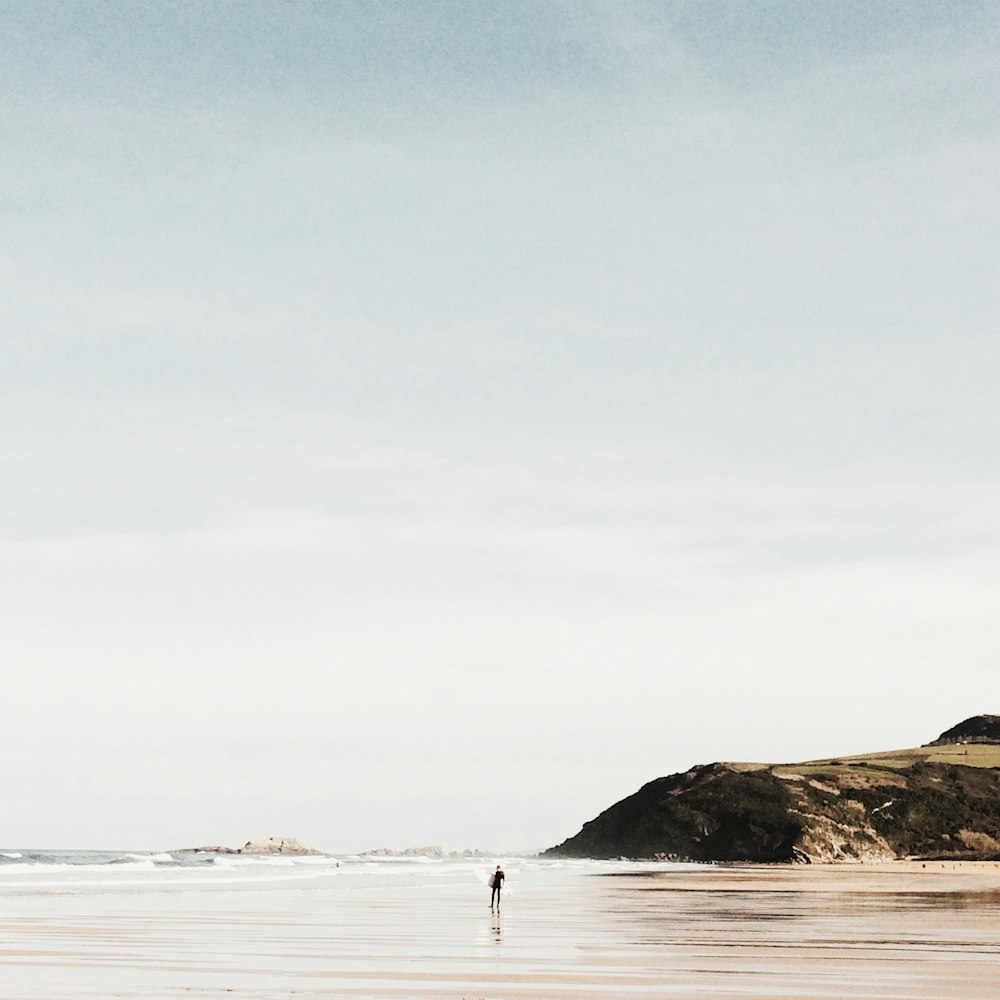 person standing on a wet land