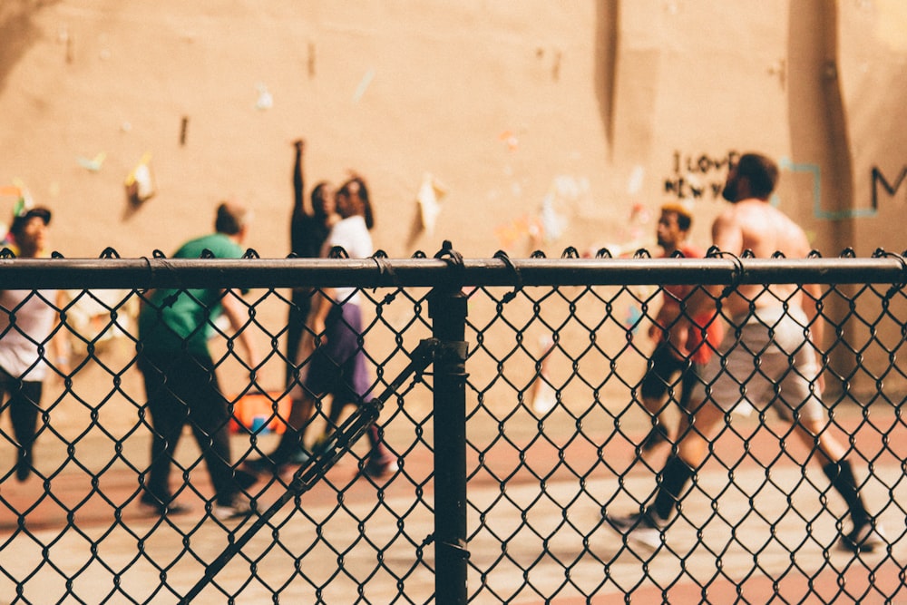 selective focus photography of black fence