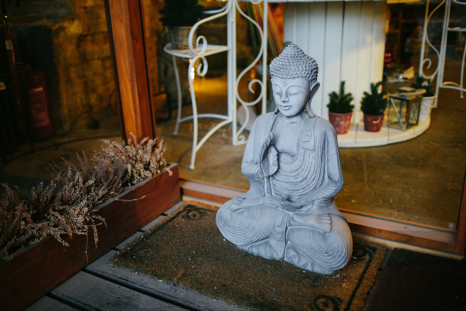 Canon EF 35mm F2 IS USM sample photo. Buddha statuette photography
