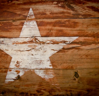 brown and white wooden star print board