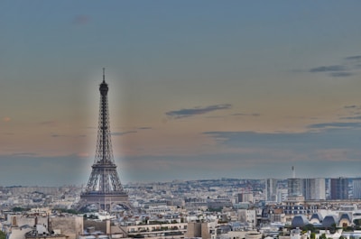 A panoramic view of Paris skyline at dusk, symbolizing the company’s local roots and global reach.