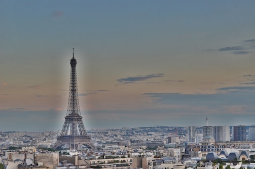 A panoramic view of the Paris skyline at dusk, symbolizing the innovative spirit of admaker tm’s home city.