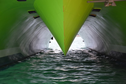 Engineers working on the hull of a vessel using sustainable materials.