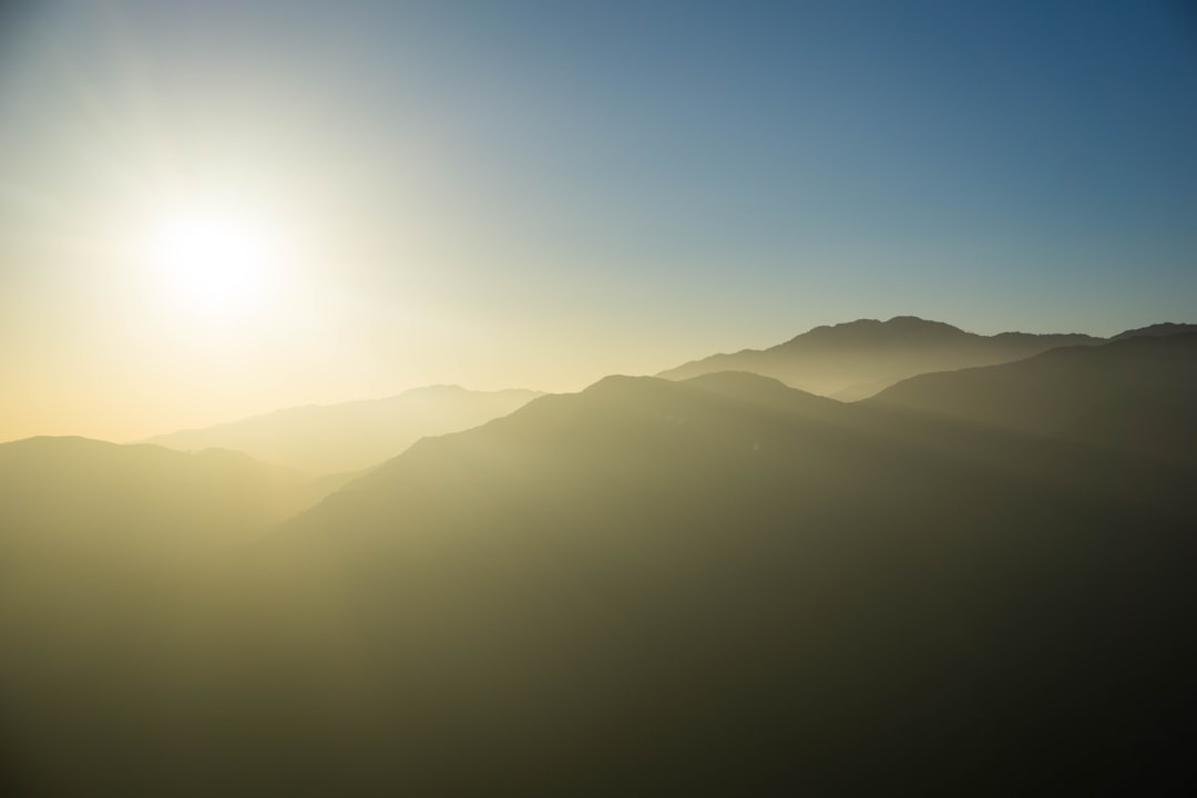 silhouette of mountain during daytime